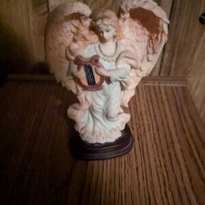 Angel with harp figurine